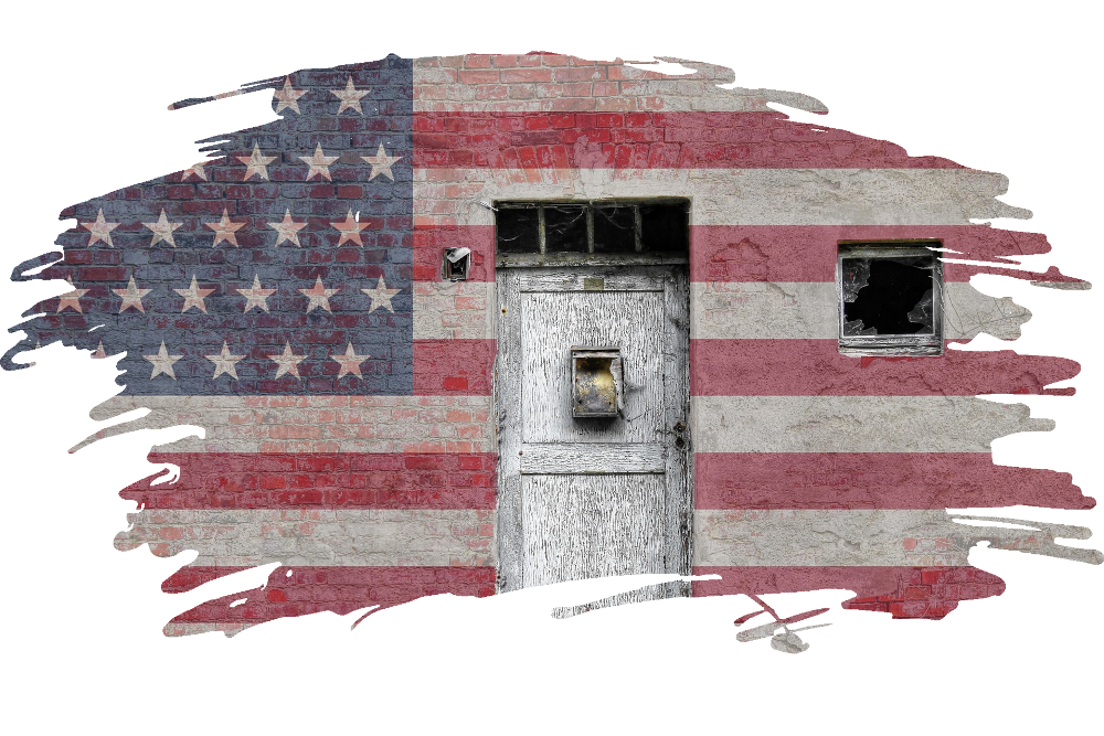 an american flag painted on a brick building with a door and a broken window